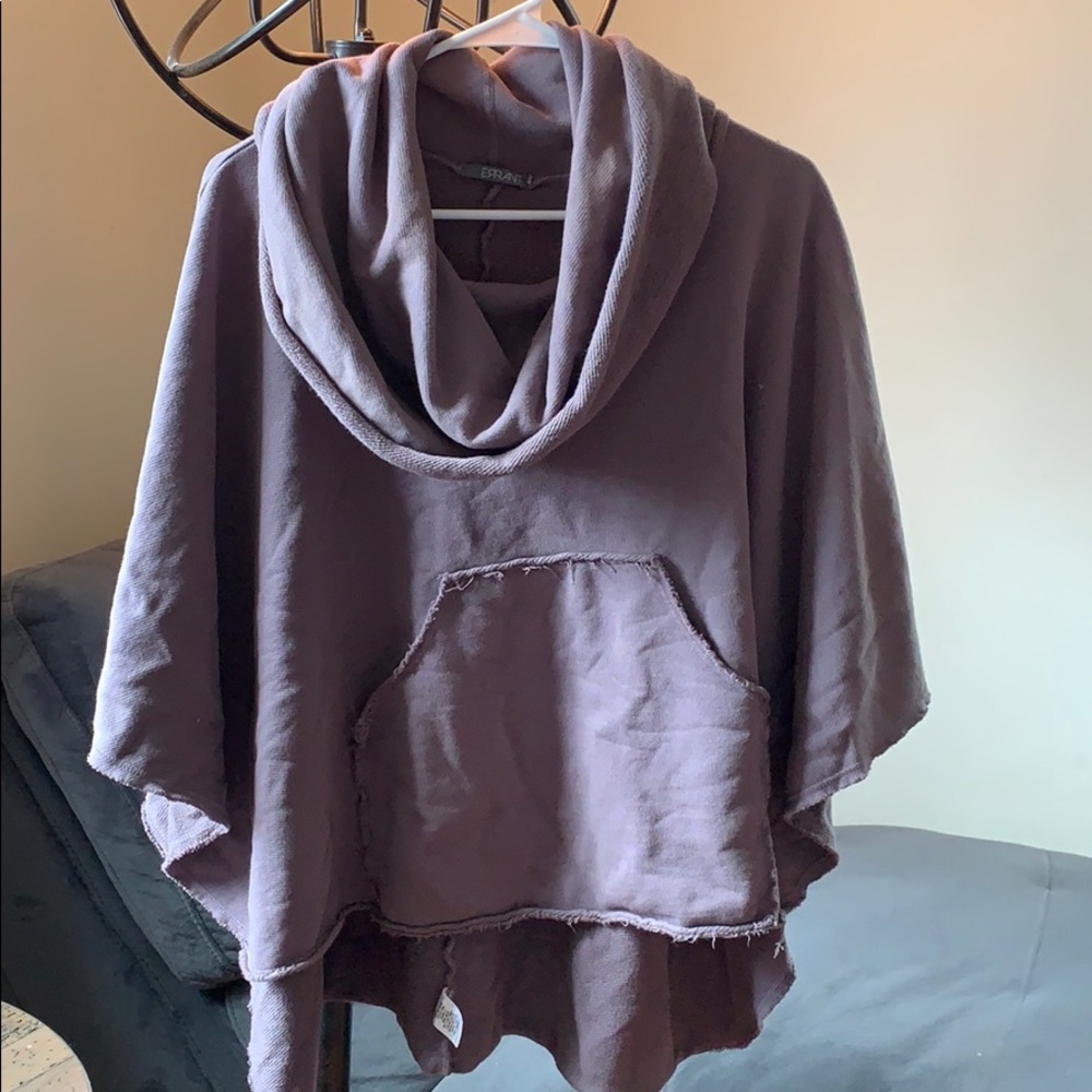 Slightly frilled light brown turtleneck sweater